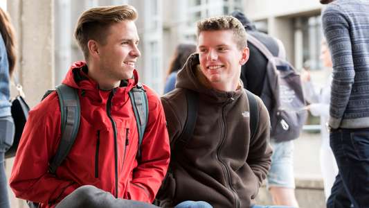 Campus Images of two students in October 2016