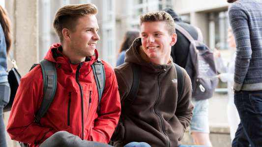 Campus Images of two students in October 2016