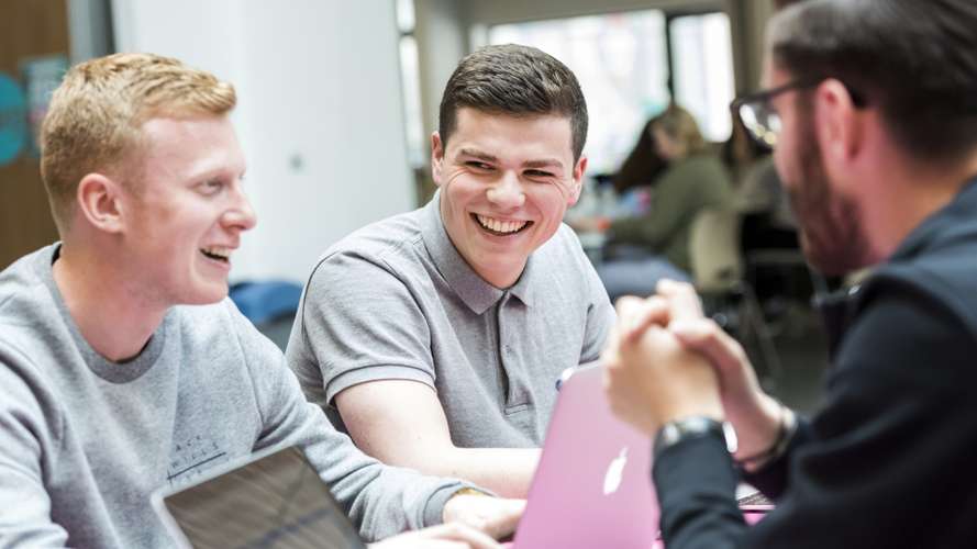 Students enjoying UNIO on campus. An independently run, ethically focused coffee shop, based in the Hive.