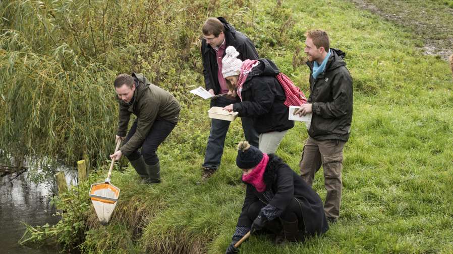 GEO students on campus, taking part in an outdoor field activity.