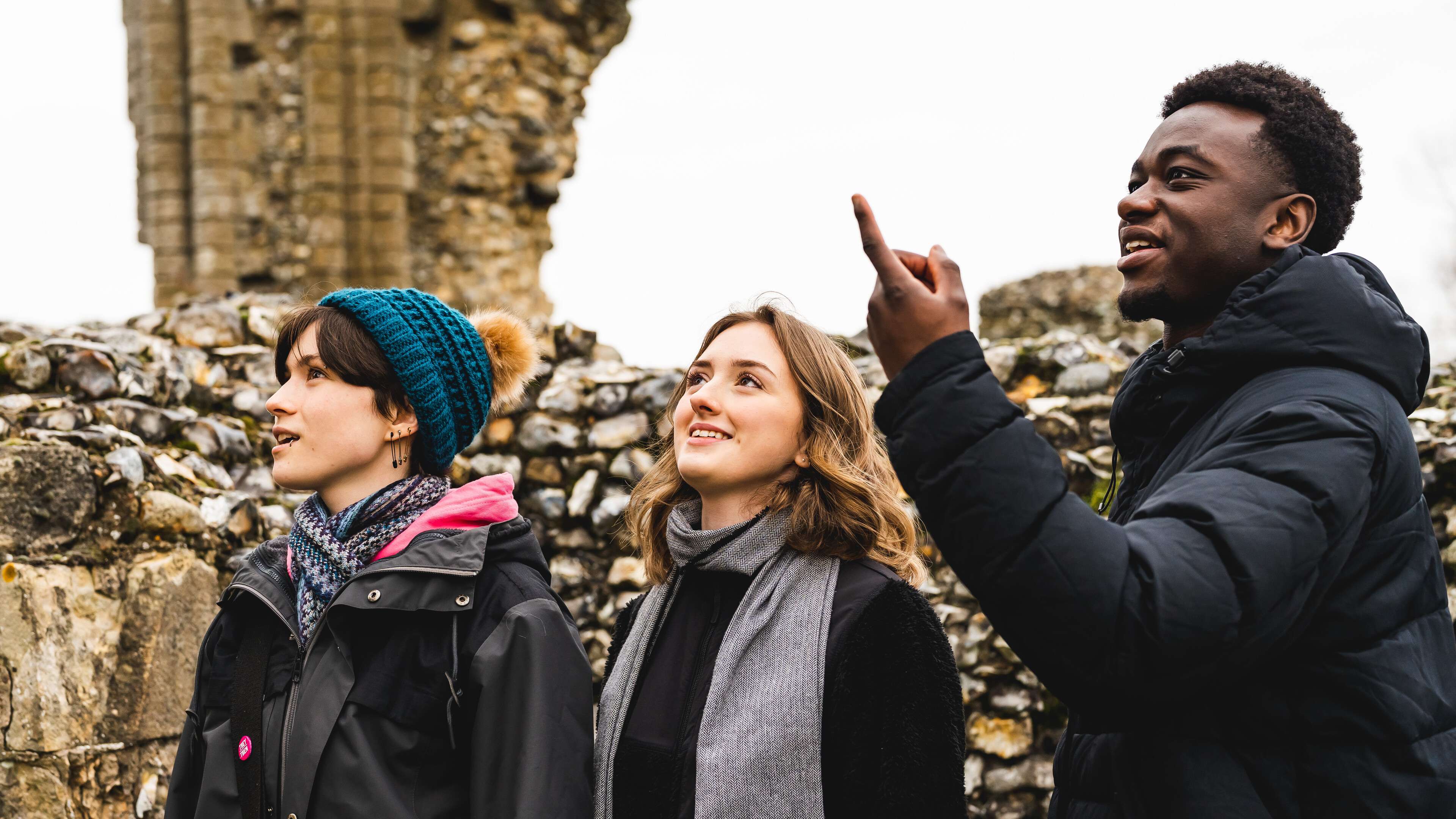 History students exploring ruins on a field trip
