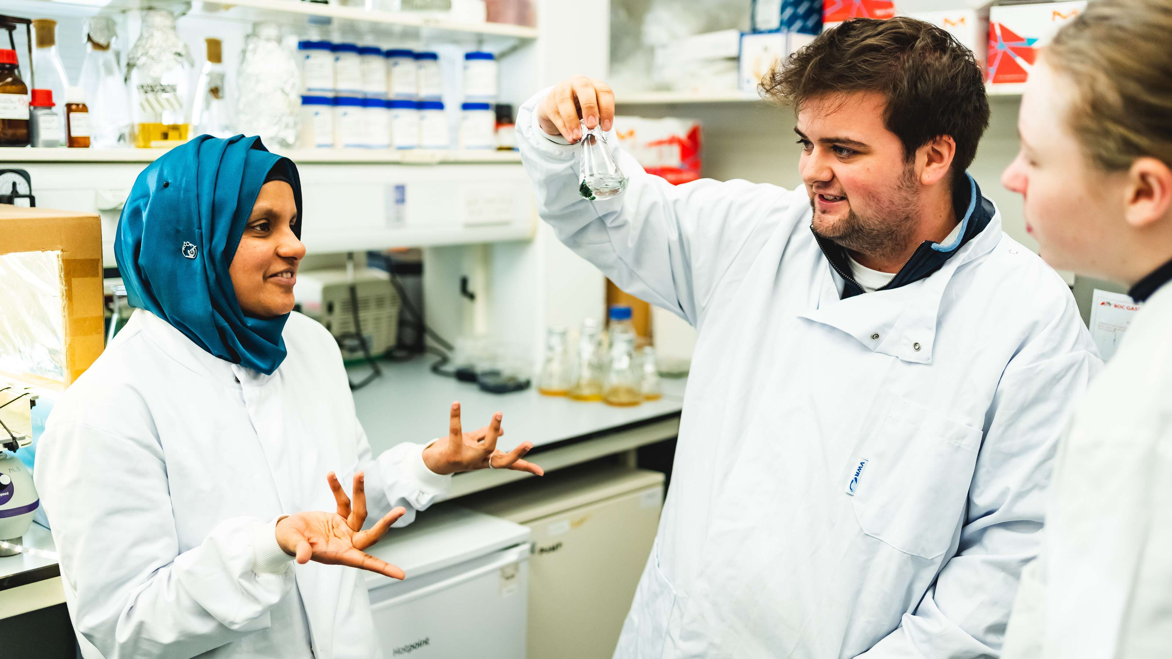 Image of students enjoying lab-based course at UEA