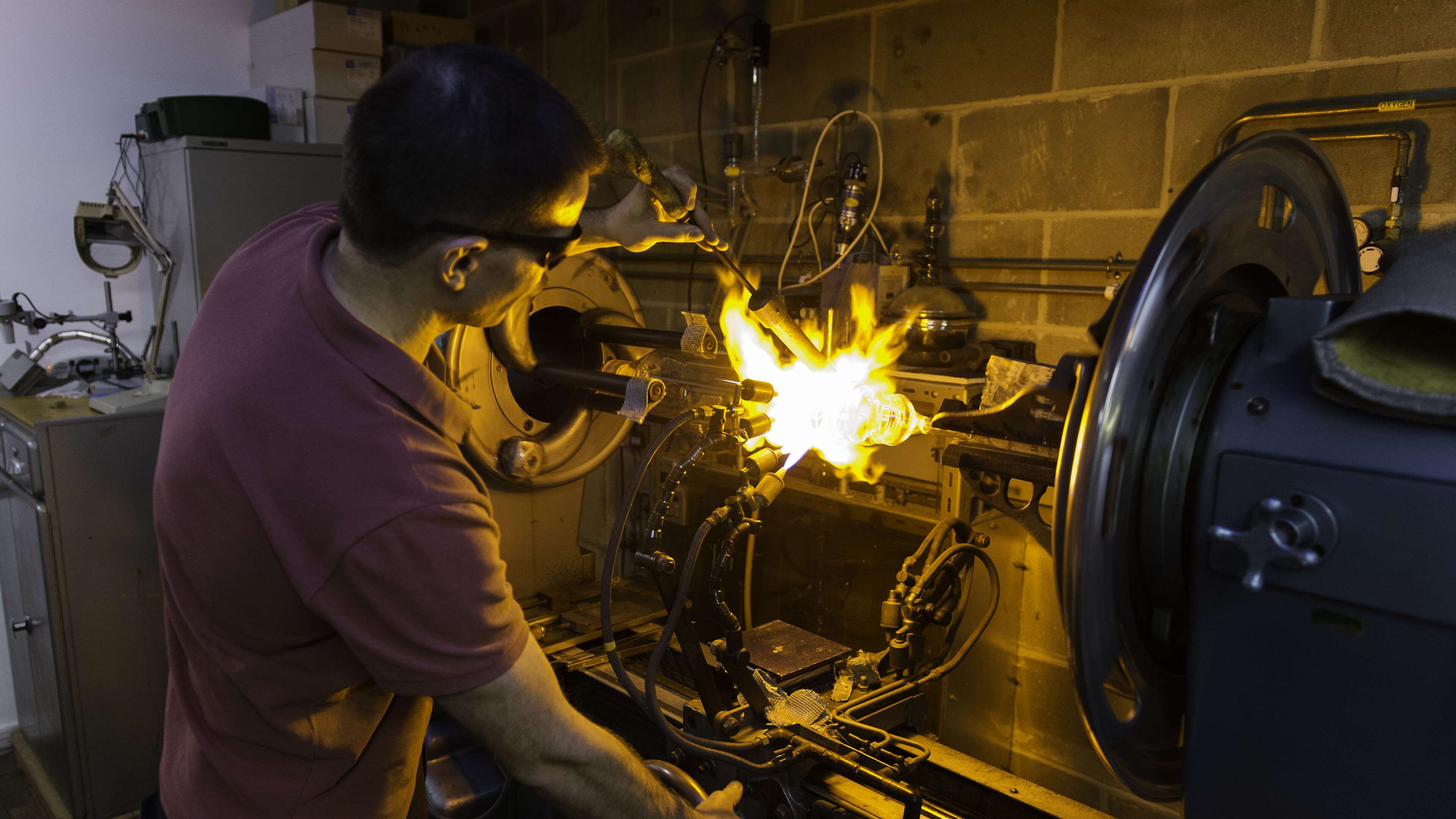 Staff member using chemistry equipment