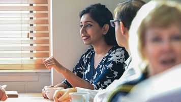 UEA staff members enjoying a coffee break together in the Vista cafe.