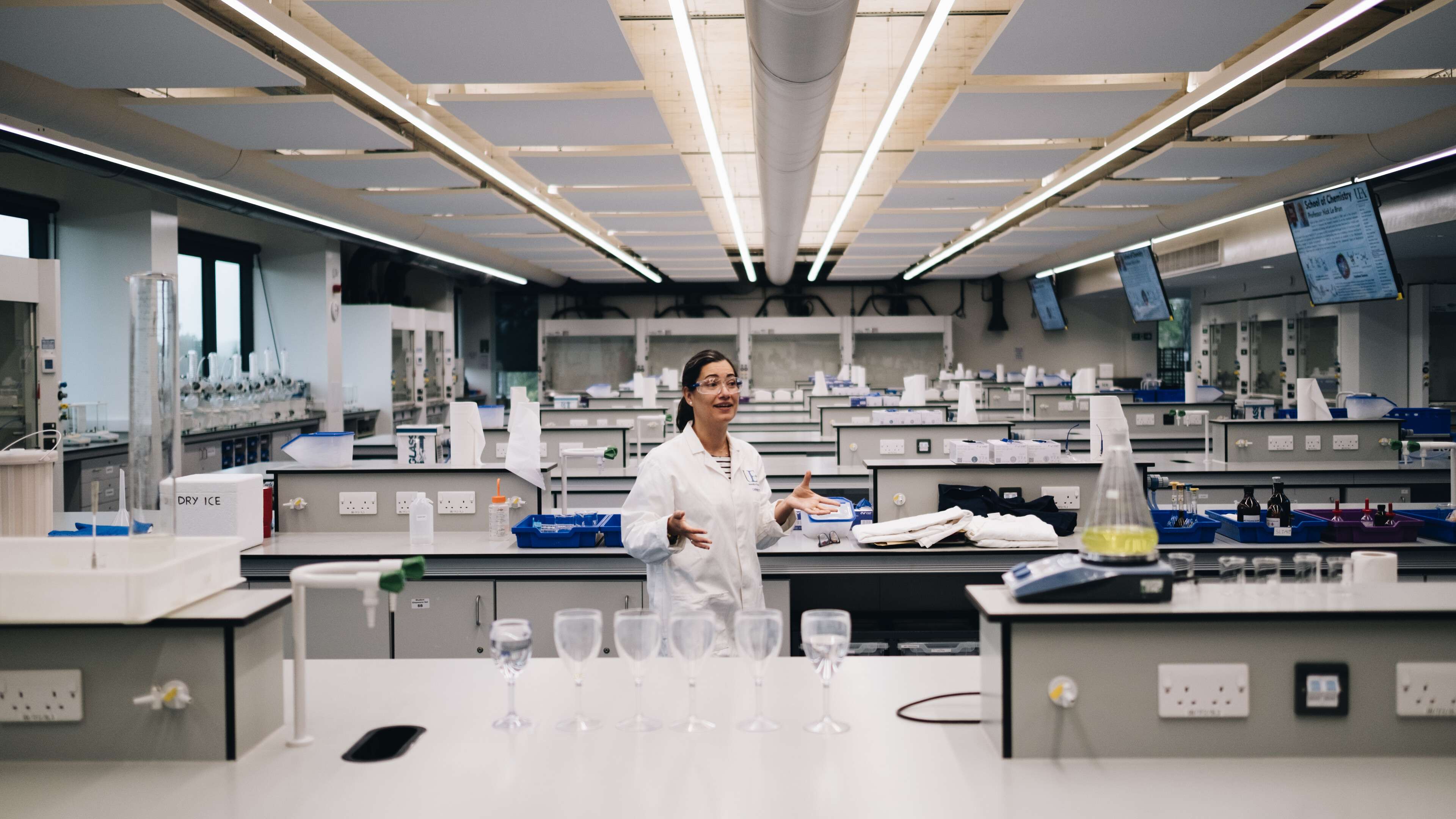 Chemistry lecturer conducting a lab experiment