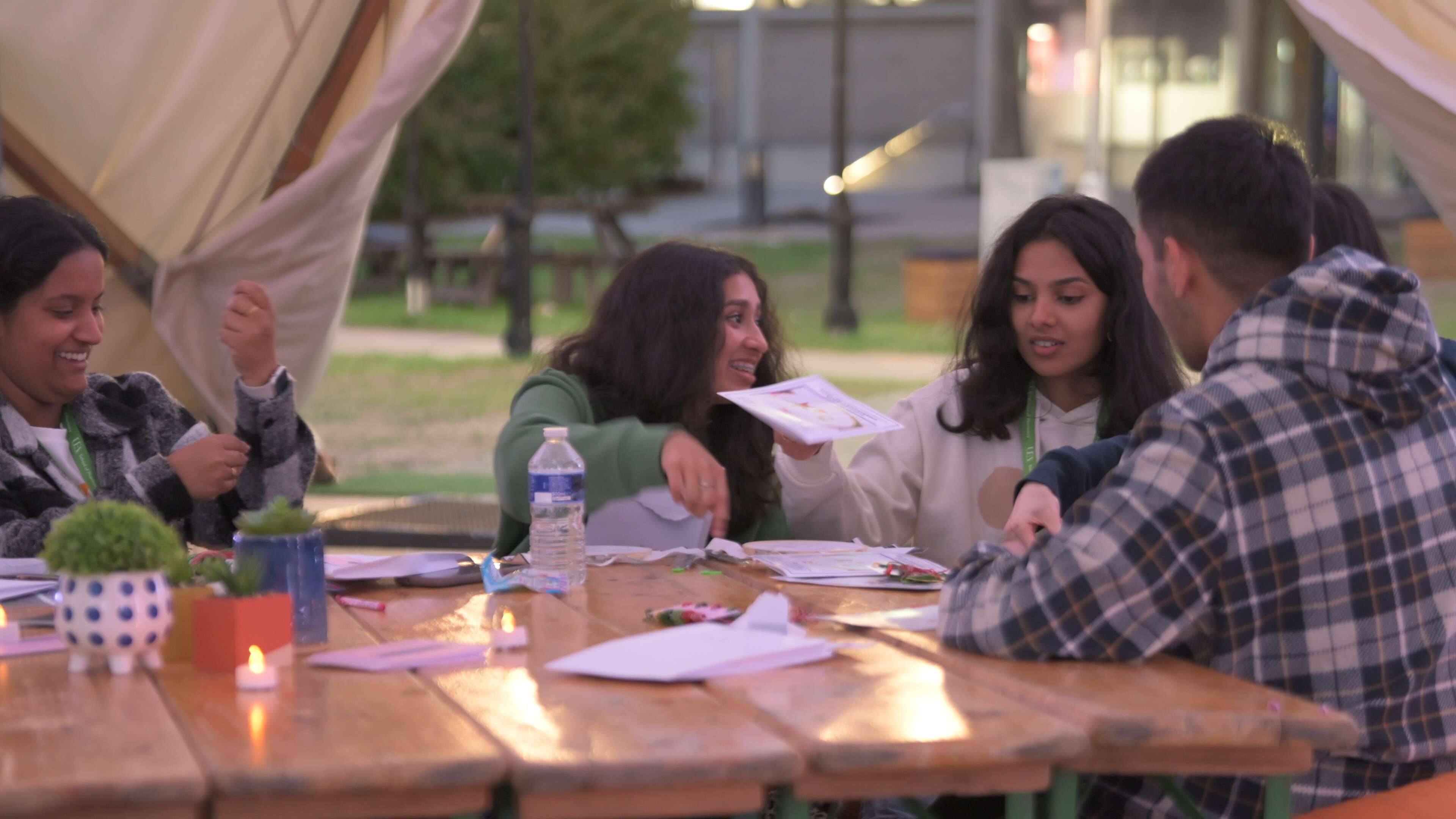 Students sitting together and crafting.