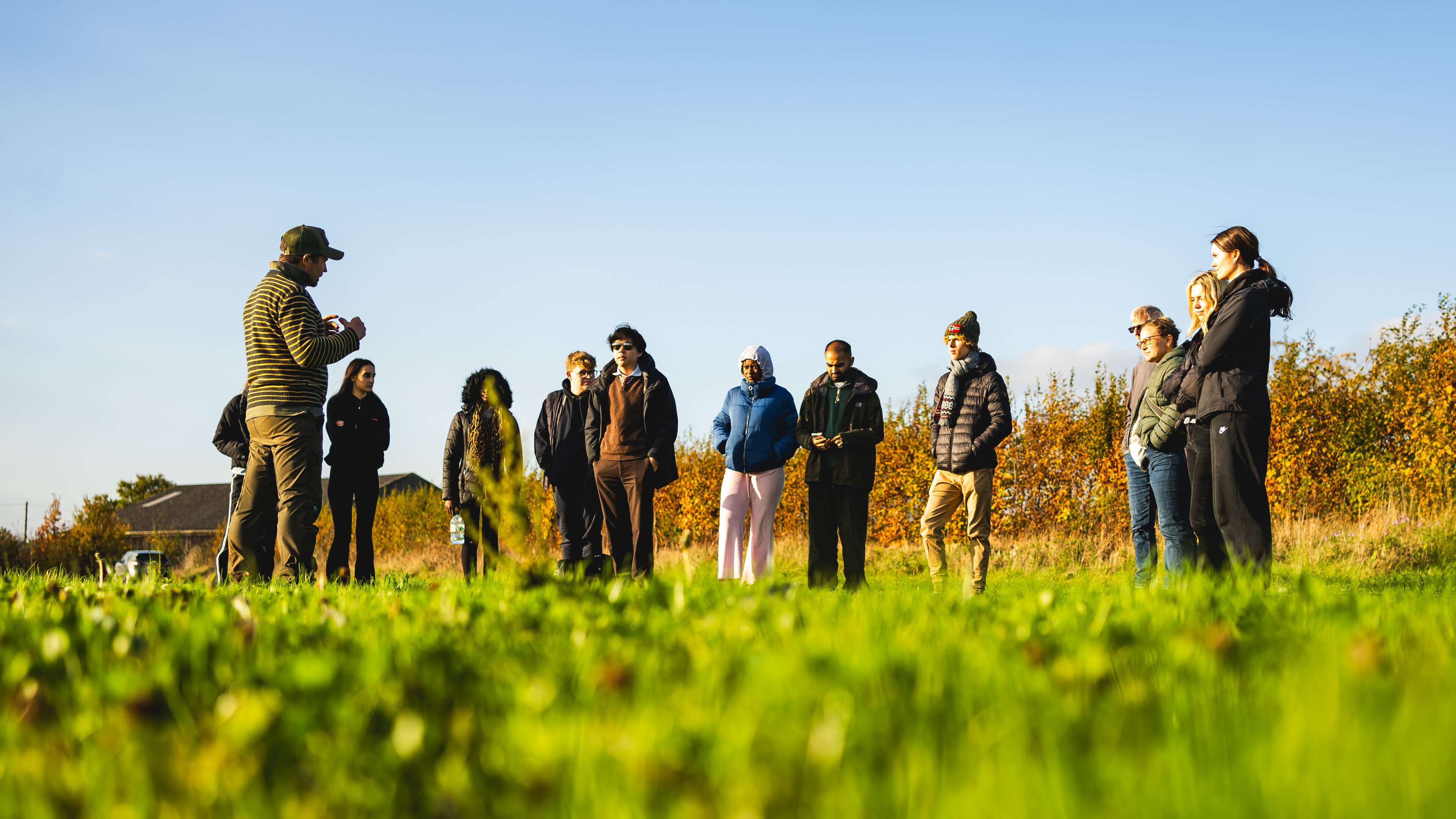 Global Development and Geography students in Holt, Norwich coastal area, taking part in an outdoor field trip at Eves Hill Farm.