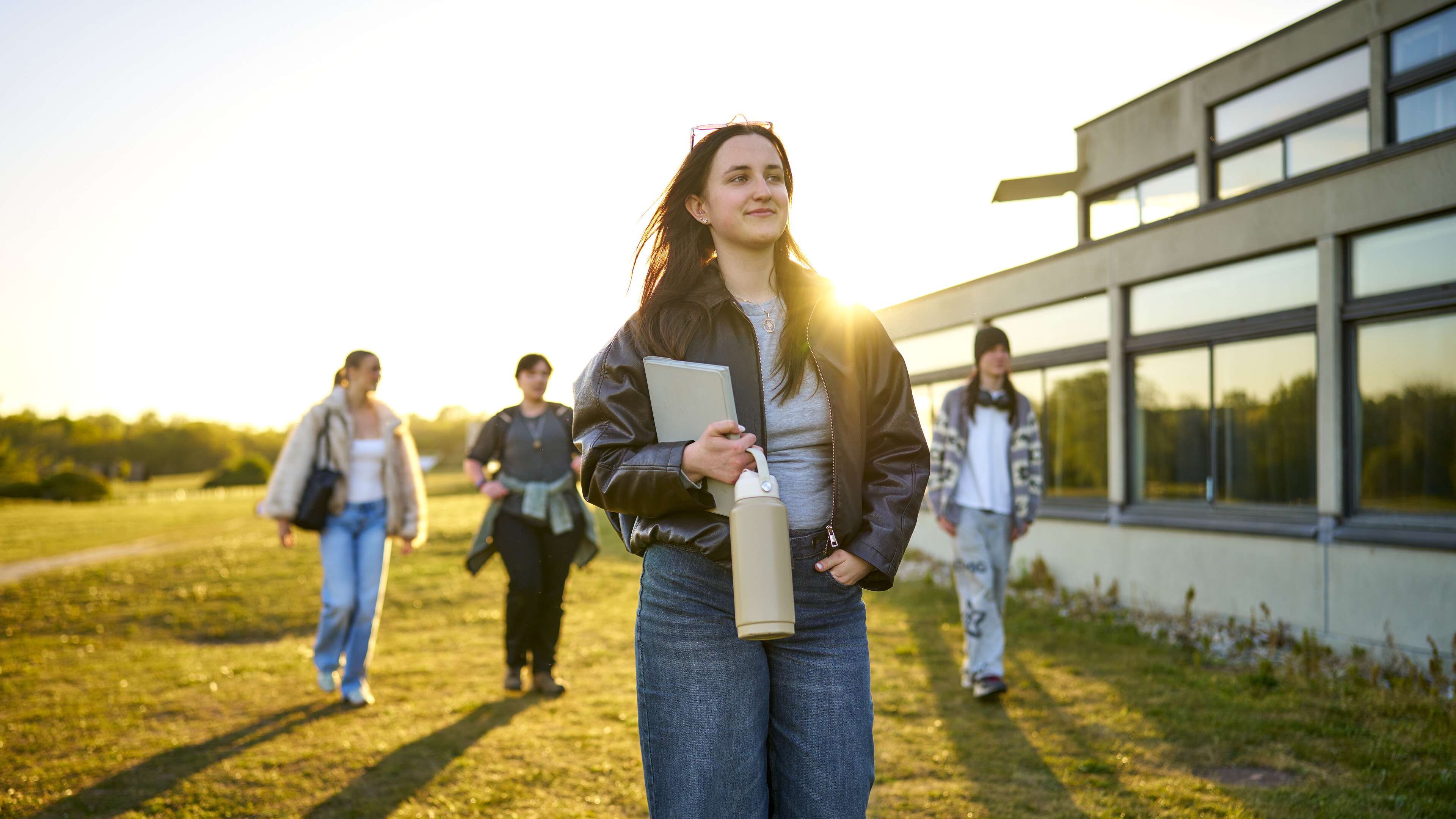 Students walking outside the Ziggurats
