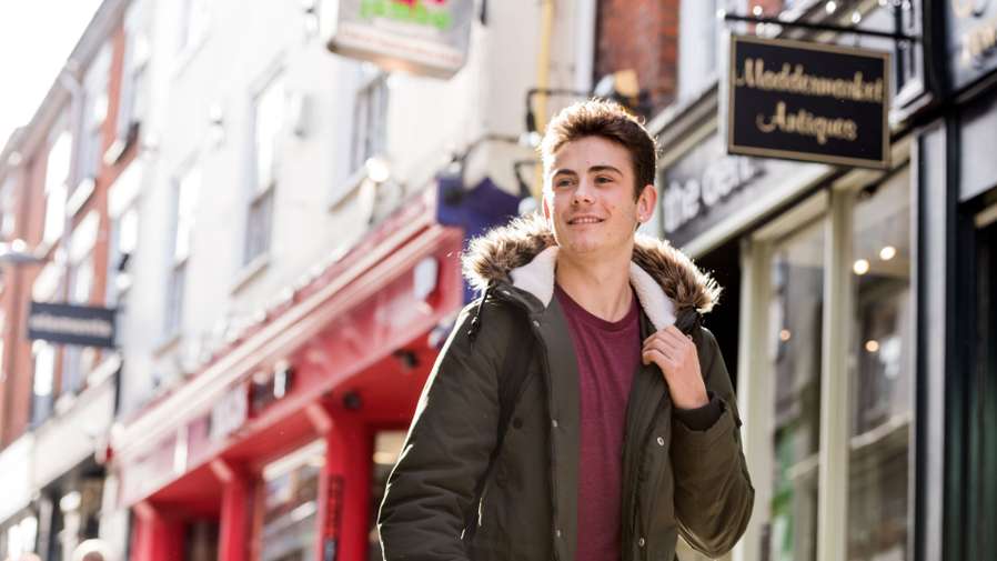 Students browsing the boutique shops and cafes, down Lower Goat Lane in Norwich city centre