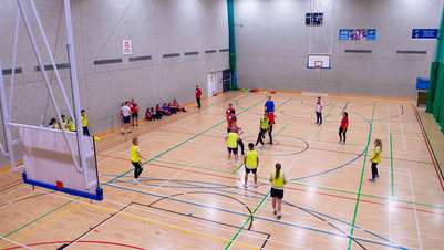 Students playing basketball at Sportspark courts