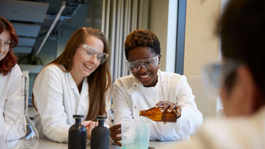 Students doing science practical in a lab in the New Science Building