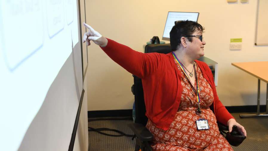 Dr Katherine Deane lecturing in Sportspark