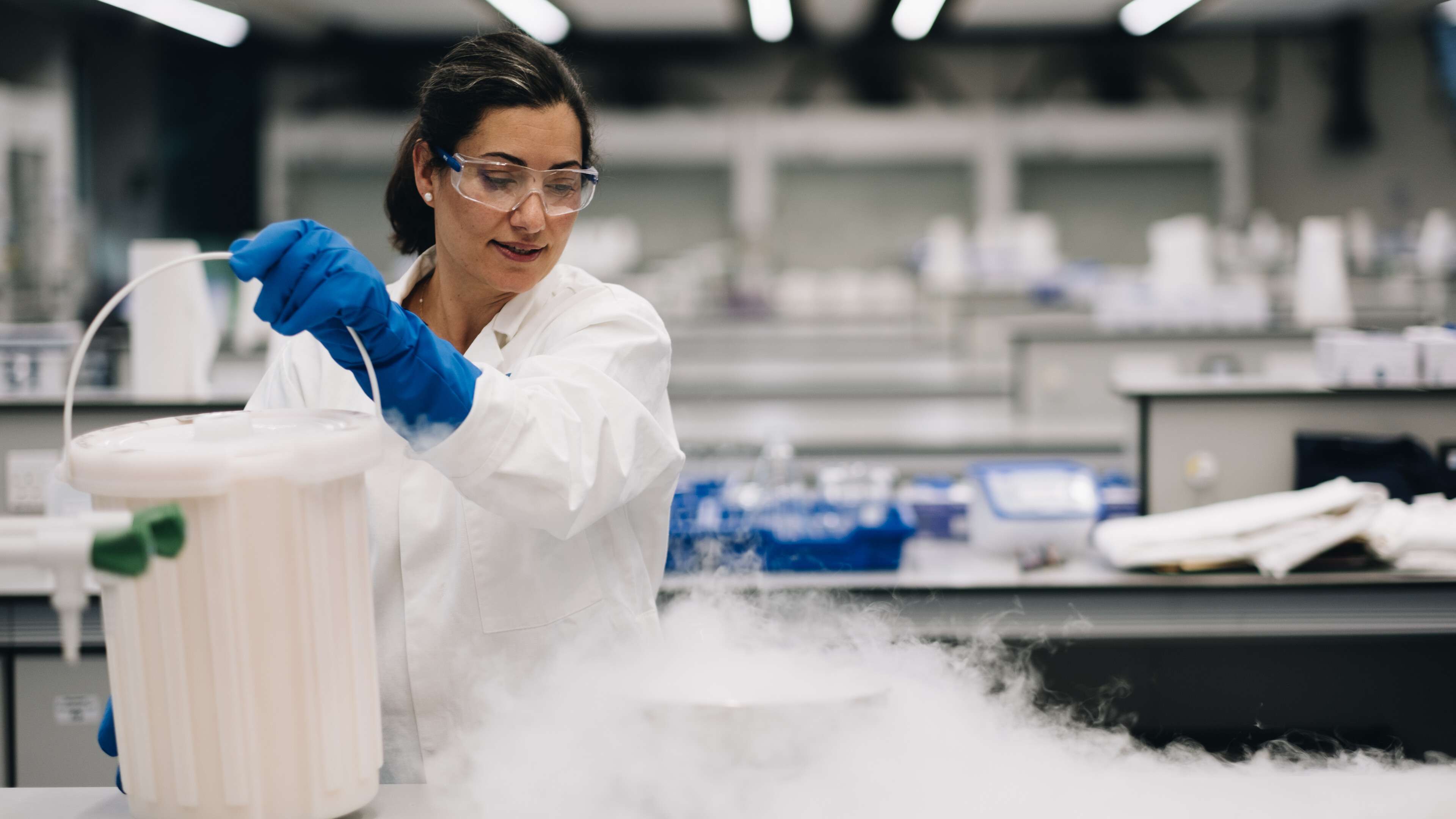 Chemistry lecturer conducting a lab experiment