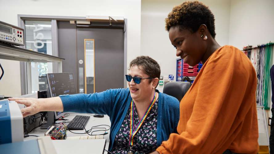 Dr Katherine Deane teaching students in an engineering lab in the New Science Building