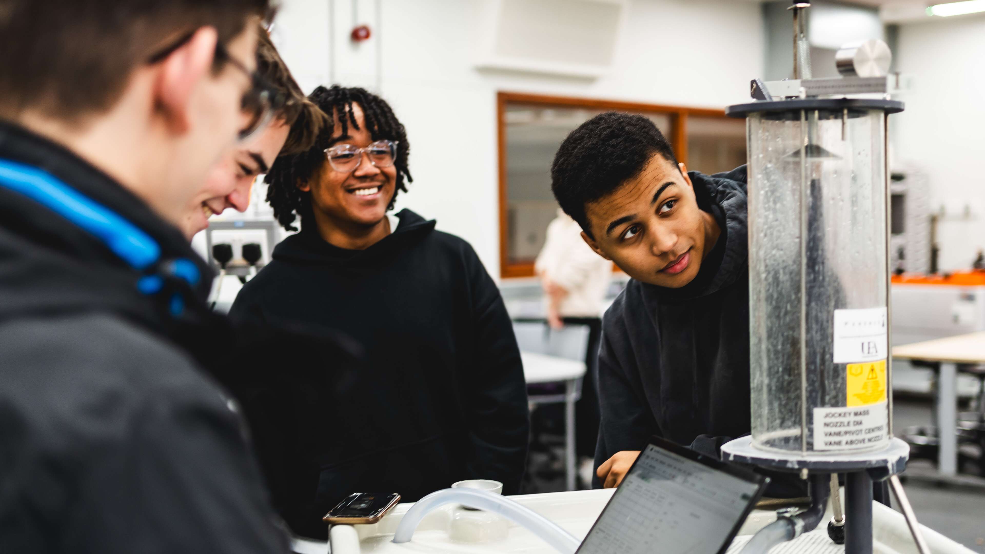 Engineering students using equipment in Productivity East