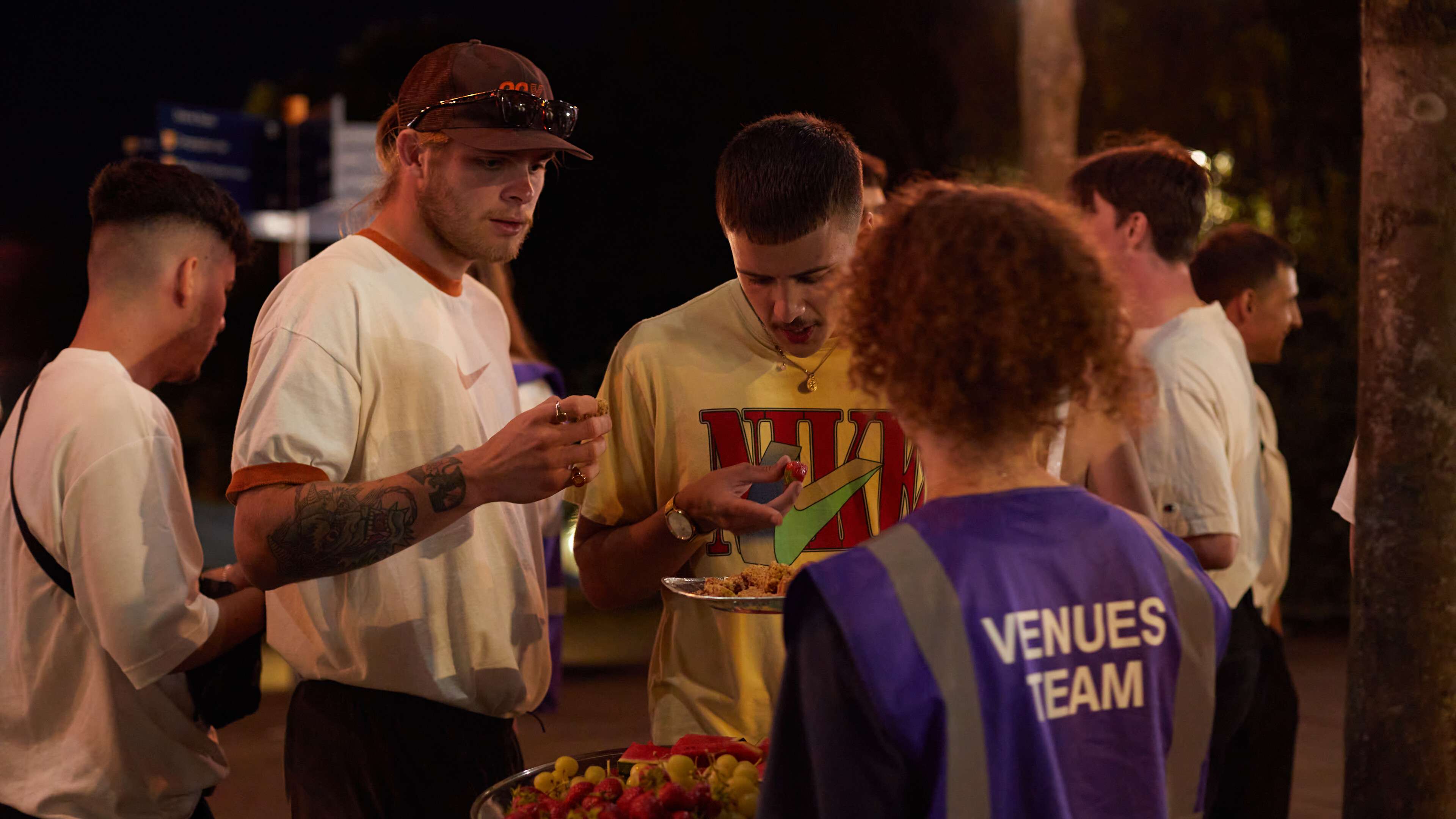 Students eating appetisers at Grad Ball