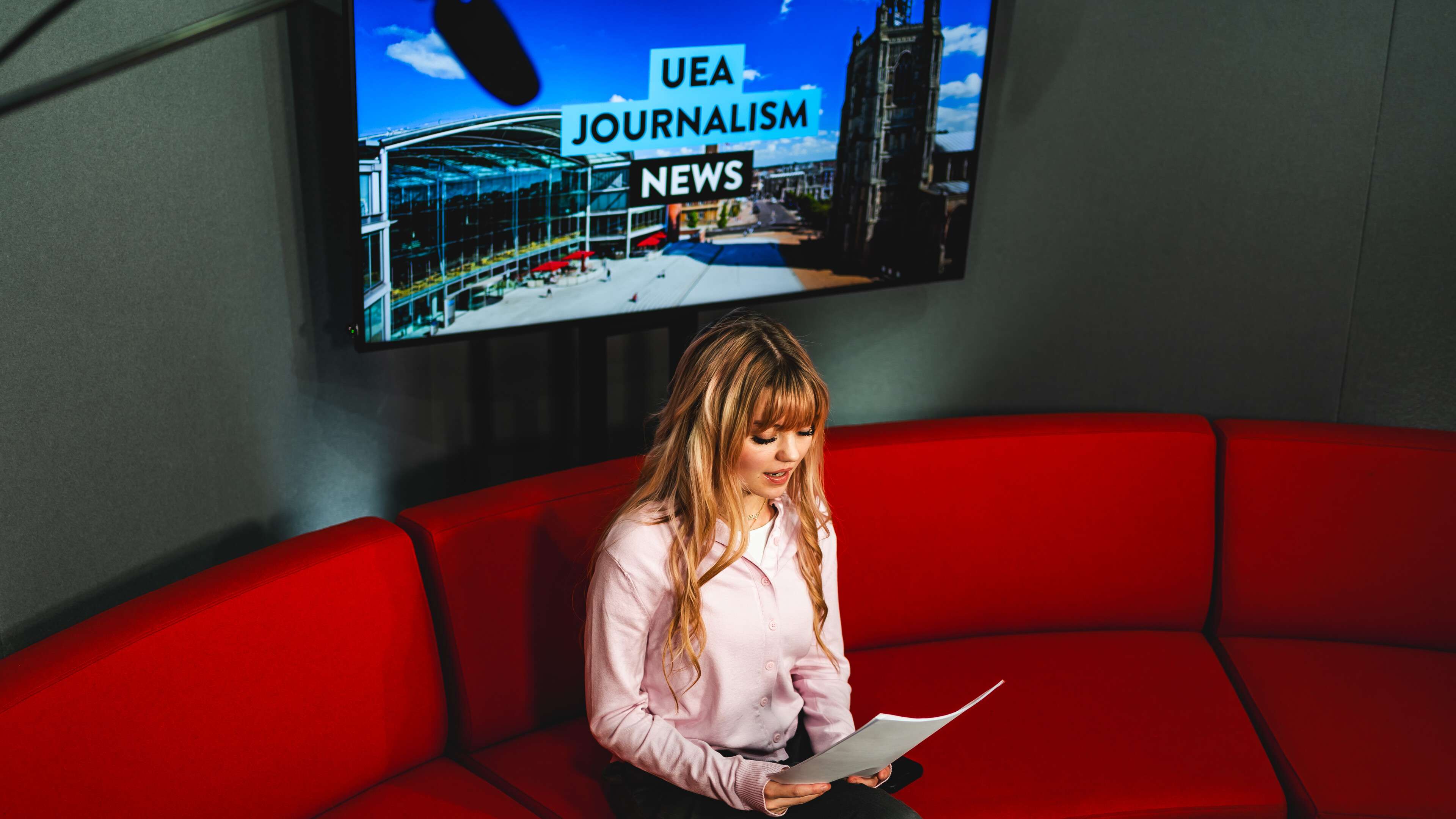 Media Students are working together in the News Room of Broadcast House