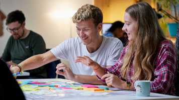 Students studying with sticky notes
