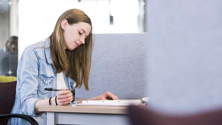 Student engaged in study in the Library