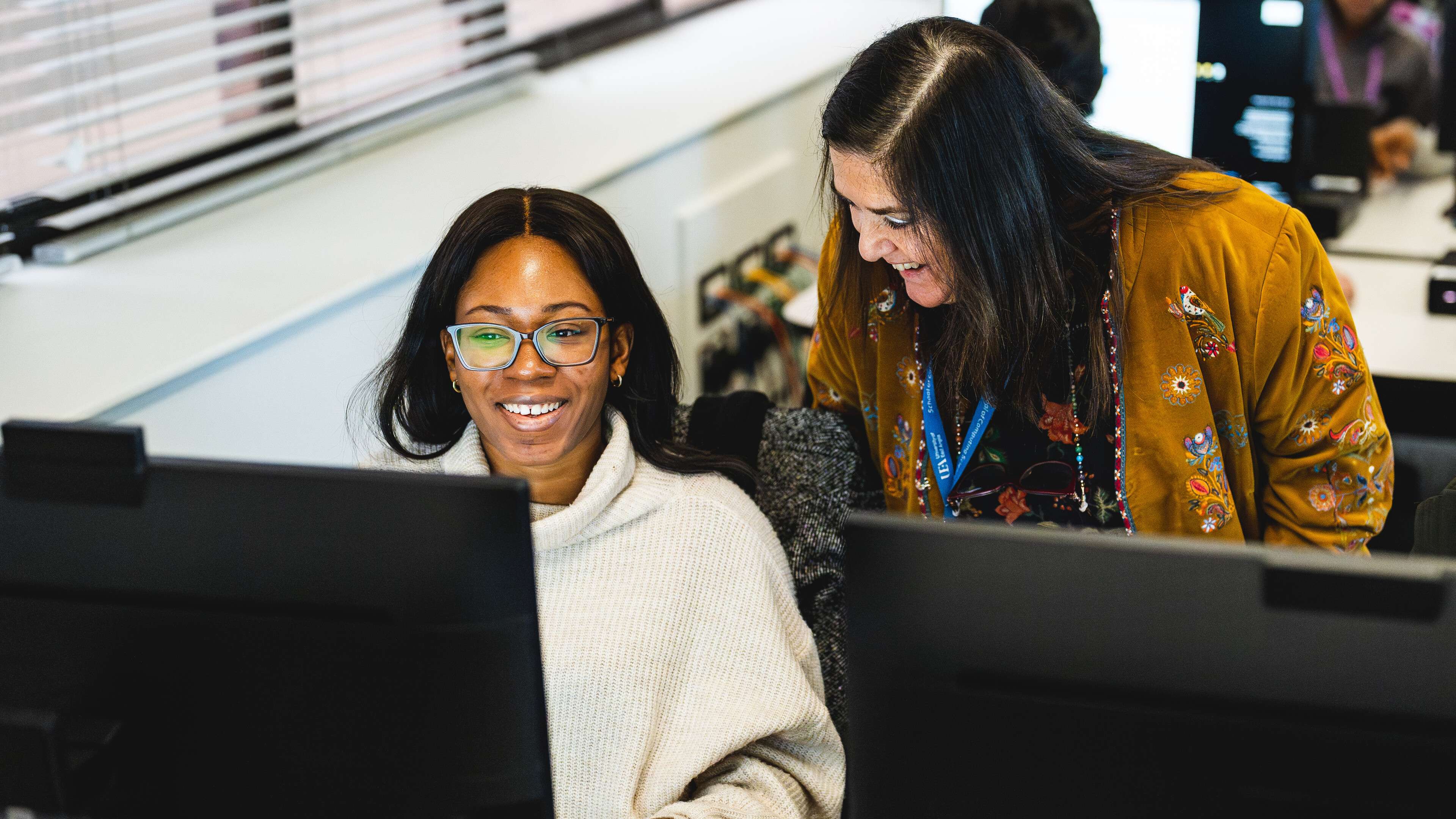 Data Science and Computing Science students working together in the Data Science and AI lab