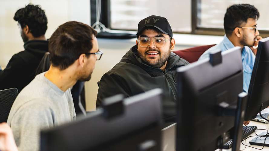 Students sitting at computers