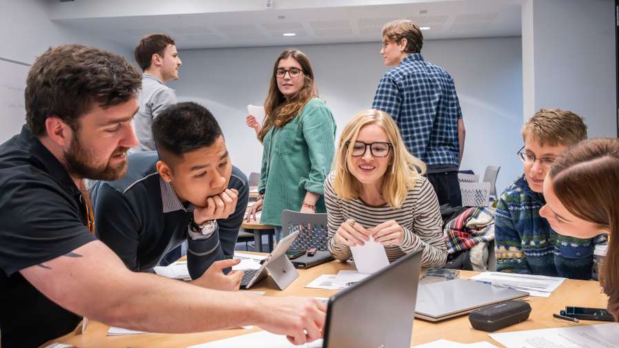 Politics & IR students working together in the War Game simulation session in the NEWSCI Building
