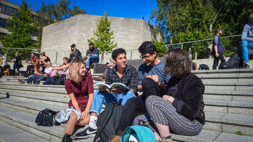 Students sitting in the Square