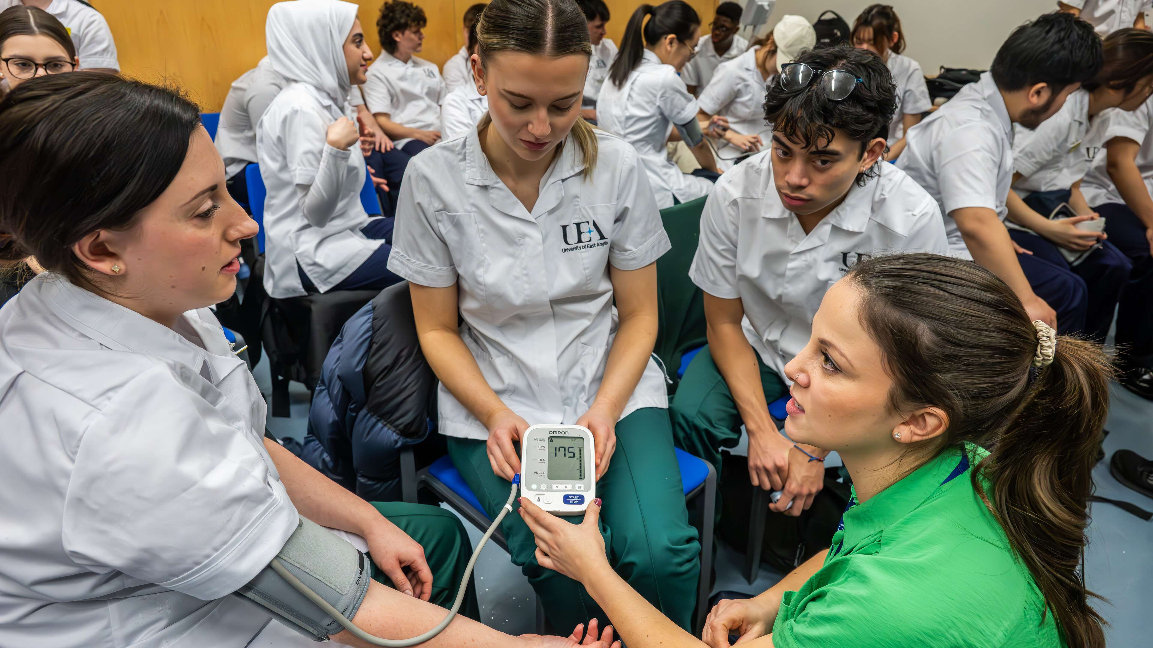 Physiotherapy students working together in a simulation session at Edith Cavell Building