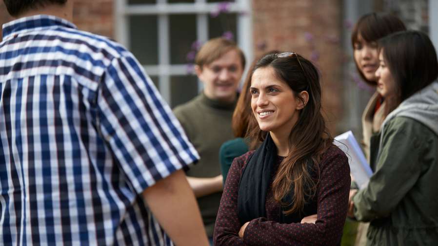 Students in discussion outside the Law School