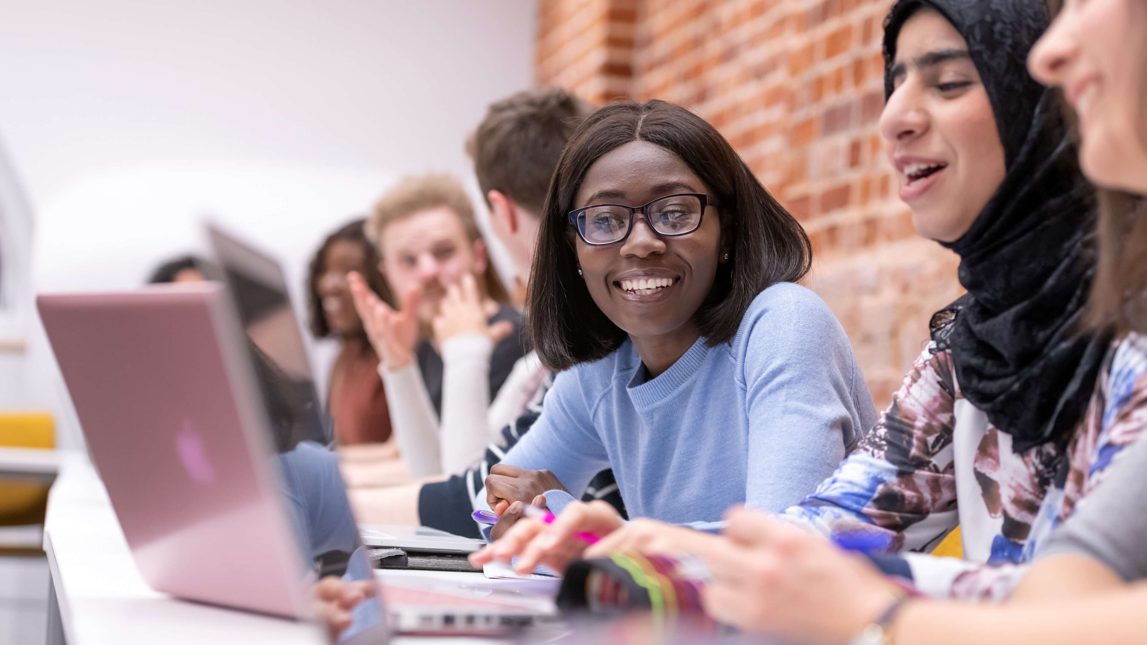Postgraduate students studying in Earlham Hall