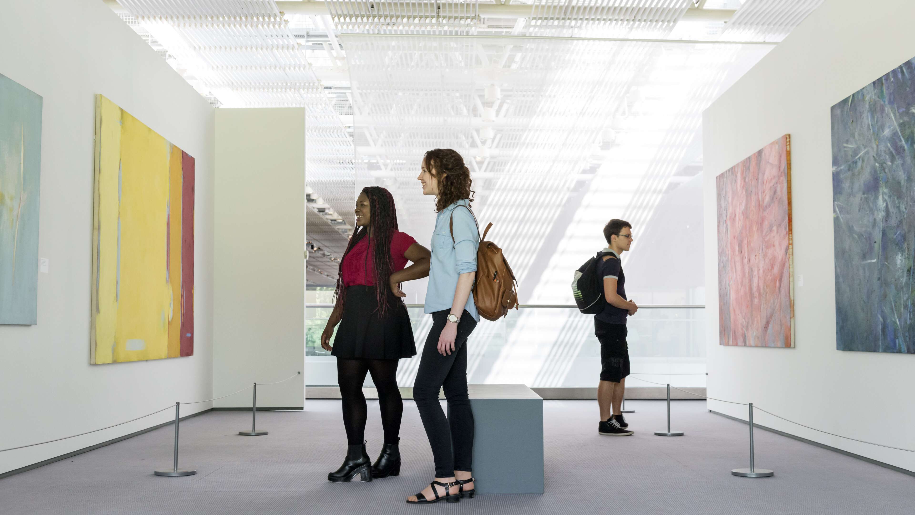 Students looking at artwork in the Sainsbury Centre