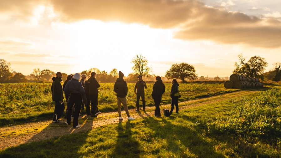 Global Development and Geography students in Holt, Norwich coastal area, taking part in an outdoor field trip at Eves Hill Farm.