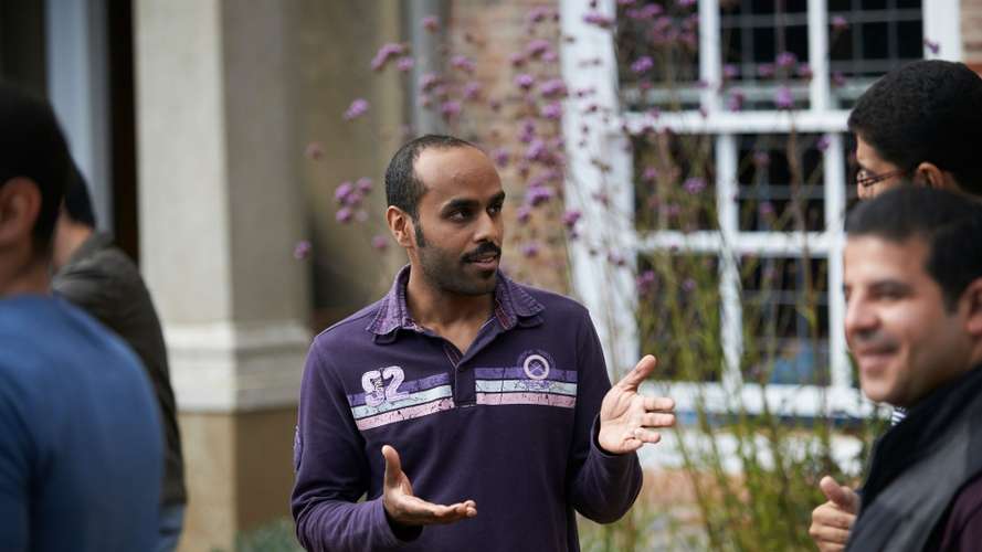 UEA Alumni outside Earlham Hall