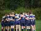 rugby team huddle - uea sport