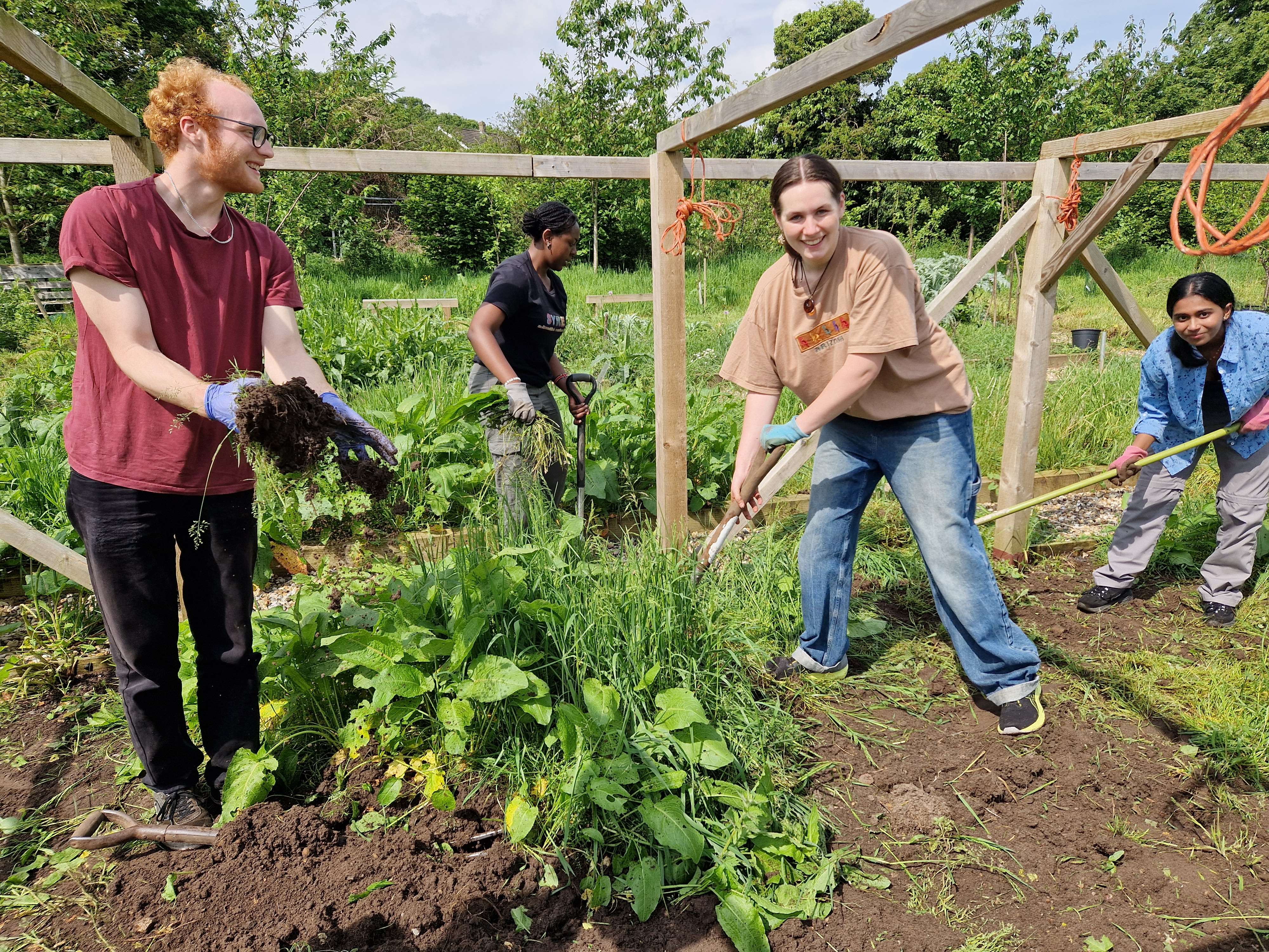 Students working on a farm during a field trip