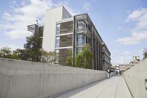 The UEA library building seen from the walkway