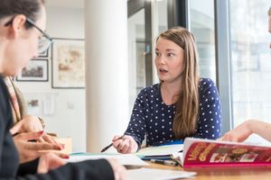 Concerned woman talking to another person