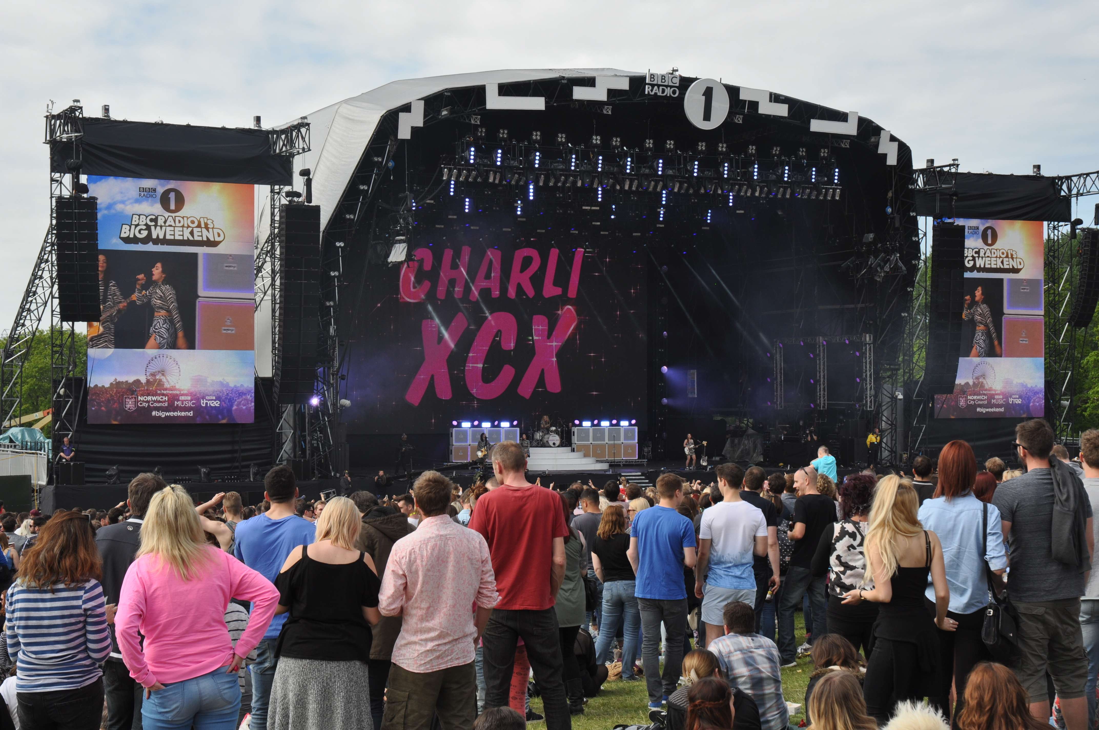 spectators watching a Charli XCX performance