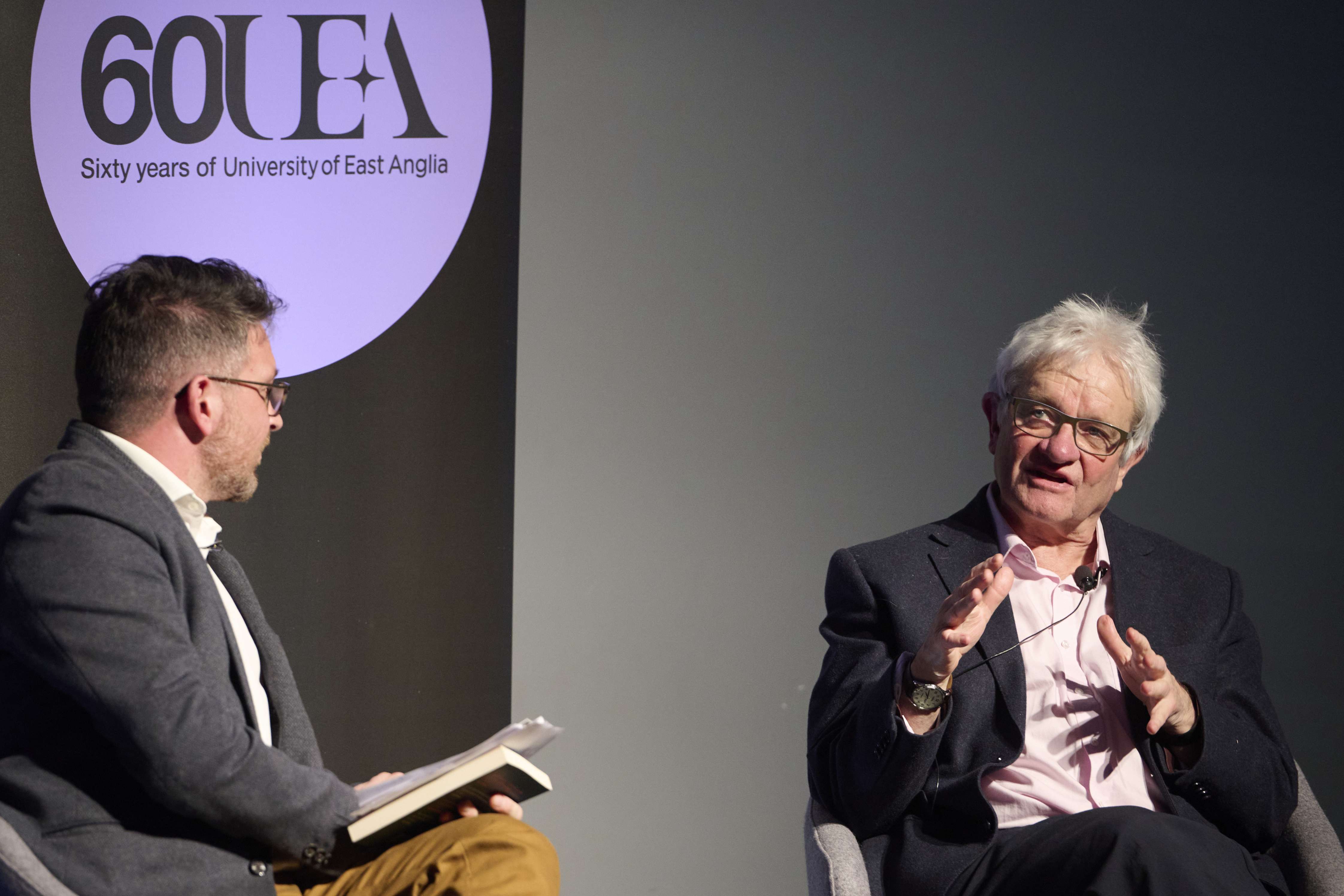 Sir Paul Nurse speaking to interviewer at the 60th Anniversary event