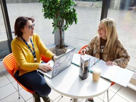 commuters-chatting-in-campus-kitchen_timeline-52441