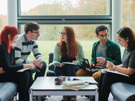 mature-students-sitting-together-collaborative-working.jpg