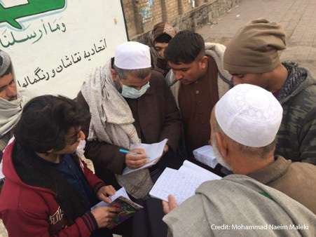 Adult male literacy learners in Afghanistan