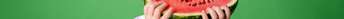 Small child eating large watermelon slice