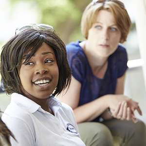 Two people looking to the right out of camera view