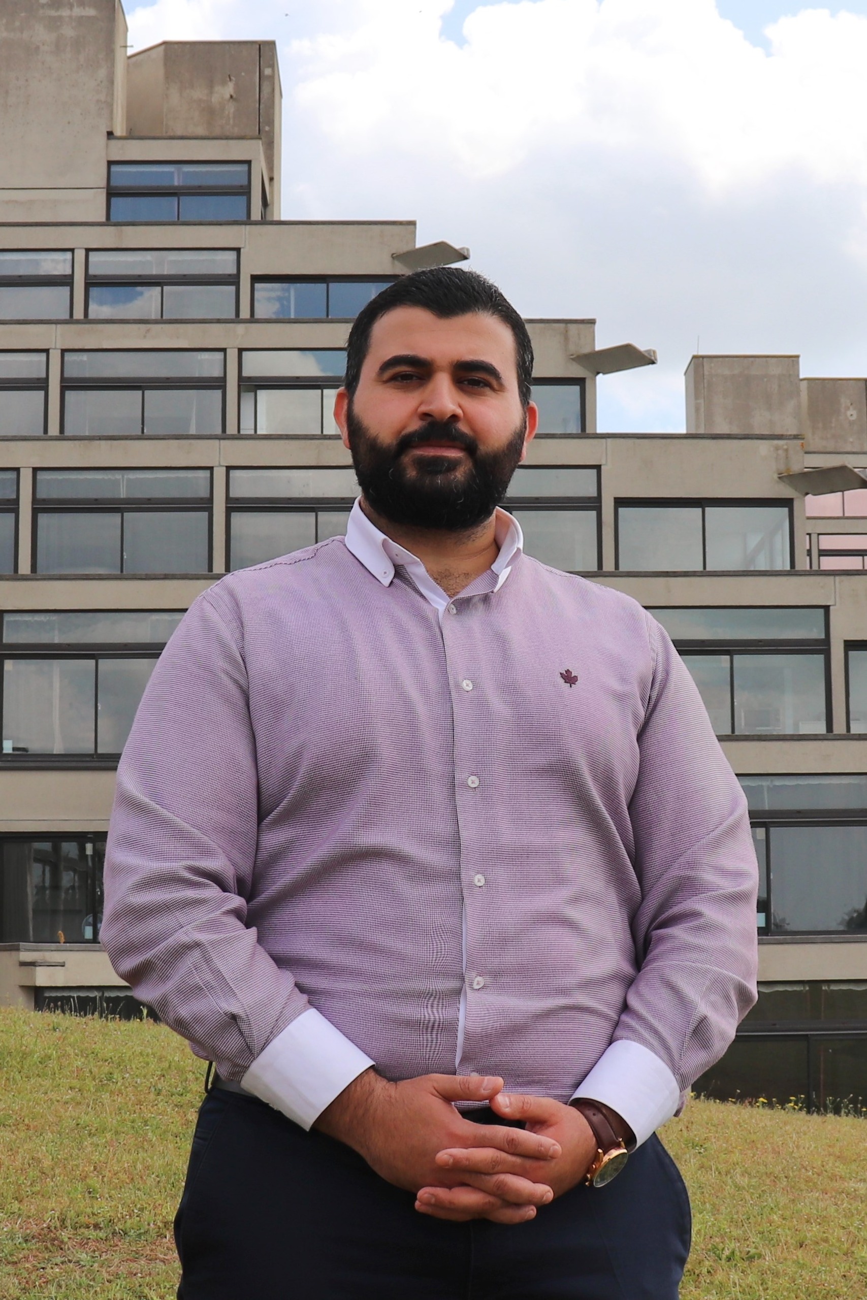 Staff member standing at UEA