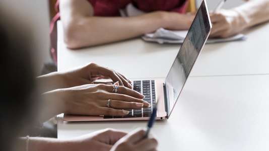 Student using laptop to access InPlace