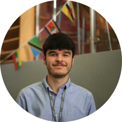 Staff member standing at UEA