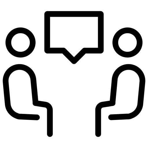 black line icon of two people sitting at a table having a meeting