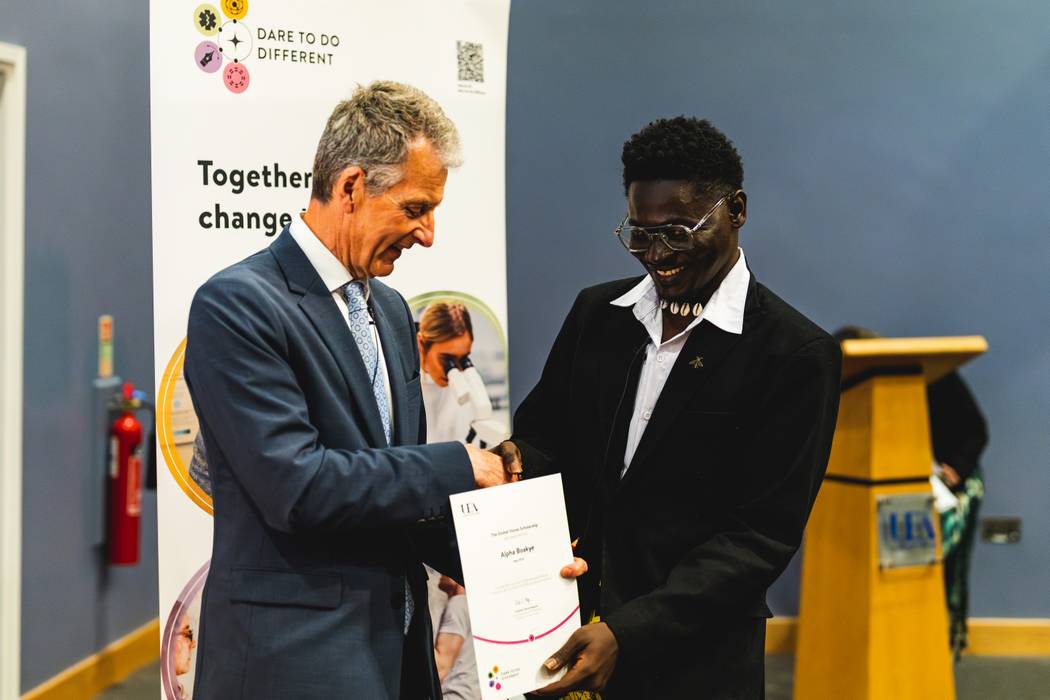 Scholar Alpha Boakye, receipient of The Global Voices Scholarship, with the VC