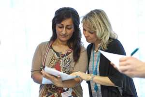 Medical student and mentor looking at assessment results